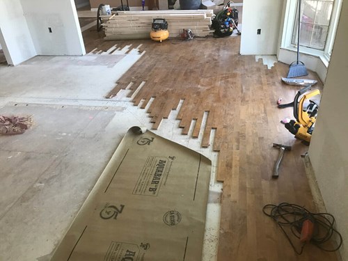 Hardwood Panel Installation in Progress